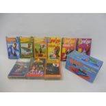 A quantity of Thunderbirds videos, a boxed Thunderbirds Talking Alarm Clock etc.