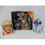 A boxed Kenner Star Wars Tie Fighter plus two Lewis Galoob Toys Star Wars promotional figures.