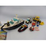 A selection of Lego including a 1987 City Police Boat, no. 4010, a 1986 Digger, no. 6658 and a