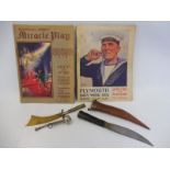 A Bosuns whistle, an official guide and souvenir for the Plymouth Navy Week 1936 a small knife in