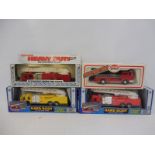 Four boxed die-cast models, all emergency response vehicles, including three by Tootsie Toys.