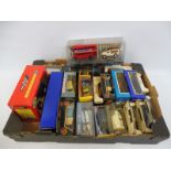 A quantity of assorted boxed die-cast models including Britains, Eddie Stobart etc.