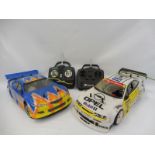 A Thunder Tiger Opel 2WD nitro saloon remote controlled car with controller plus an Acme Racing