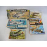 Six assorted boxed scale model kits including Heller, Airfix and Matchbox.