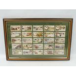 A framed and glazed set of reproduction Stephen Mitchell & Son cigarette cards, series of 25