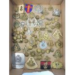 A tray of assorted military insignia, regimental cap badges etc. including Royal Engineers, Royal