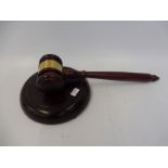 An auctioneer's or chairman's gavel.