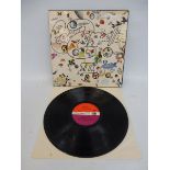 Led Zeppelin 3 first press, purple and maroon label, rotating wheel sleeve in excellent condition,