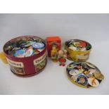 Two large tins of badges to include 1980s pop music related, plus a boxed Cussons Walt Disney Donald