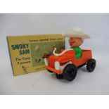 A boxed Louis Marx battery operated Smoky Sam 'The Crazy Fireman'.