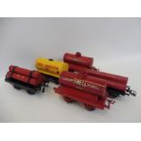 A group of five Hornby O gauge pieces of rolling stock including two with Shell branding, one