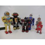 A quantity of contemporary tinplate robots.