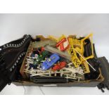 A quantity of assorted Scalextric accessories including cars.