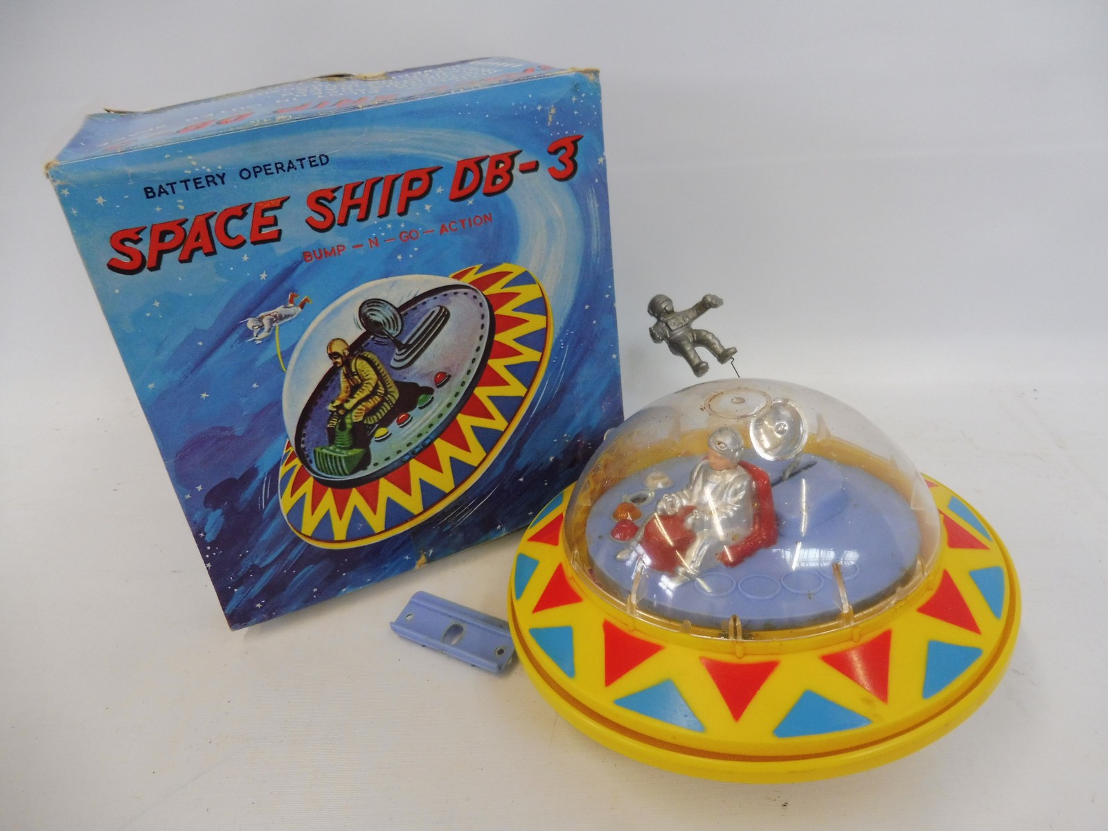 A boxed battery operated Space Ship DB-3, made in Hong Kong.