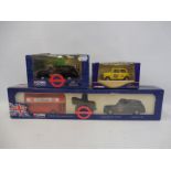 A boxed Corgi Collection London Routemaster Bus gift set, a London Taxi from the same series and one