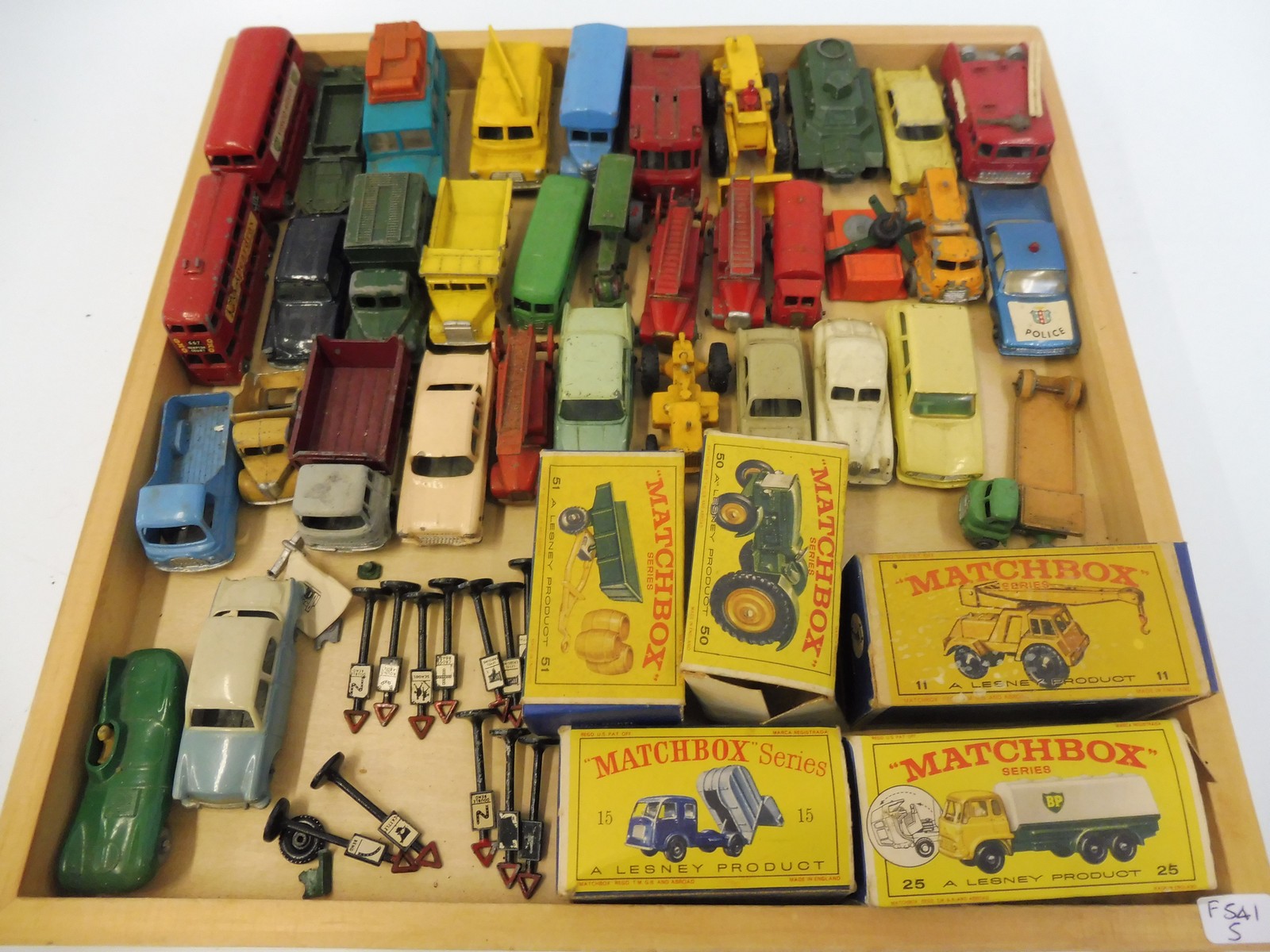 A quantity of unboxed Lesney Matchbox models including a D-Type Jaguar, a Hillman Minx and a