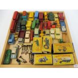 A quantity of unboxed Lesney Matchbox models including a D-Type Jaguar, a Hillman Minx and a