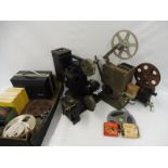 A quantity of cine equipment to include reels etc.