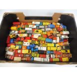 A tray of small scale die-cast models including Matchbox.