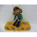 A boxed Pelham puppet 'Girl', 1970s plain original outfit, open mouth in unstamped box.