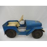 A 1960s/1970s tinplate pedal car in the form of a Jeep.