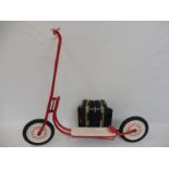 A Rosetti Rambler child's accordion plus a scooter (probably 1950s Tri-ang).