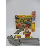 A boxed Matchbox Motorised Motorway M-1 plus two boxed Matchbox Superfast sets of track.