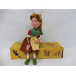 A boxed Pelham puppet 'Gretel', late 1960s, felt flowers in headband still good, original strings