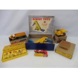 Five boxed Dinky Toys plus an empty trade box.