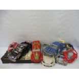 A selection of various remote controlled car instruction manuals, tools etc. and various remote