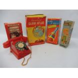 A boxed Chad Valley Educational Globe Atlas, a boxed Merit Ring A Bell and a Mechanical Telephone