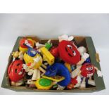 A box of M & Ms promotional plastic and soft toys etc.