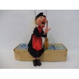 A boxed Pelham puppet 'Witch', late 1950s, still retaining broomstick, in generally good