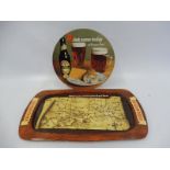 A Double Diamond pictorial showcard, 8 1/2" diameter plus a Brickwoods beer tray, 14 1/2 x 8".