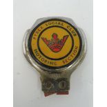 A Pyrex Social Club Motoring Section car badge.