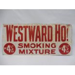 A Westward Ho! Smoking Mixture rectangular enamel sign with older amateur retouching, 40 x 18".