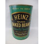 A cardboard oversized Heinz Baked Beans shop display.