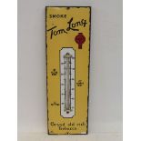 A Tom Long Tobacco enamel thermometer sign, in excellent condition, 7 1/2 x 22 1/2".