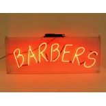 A Barbers neon illuminated sign, 38" wide x 14 3/4" high x 3" deep.