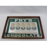 A Fry's Chocolate 'Five Boys' advertising mirror, unusual green version, probably 1970s, 20 1/2 x 13