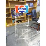 A Pepsi four tier display rack with sign pediment 46" high.