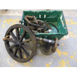 A quantity of brass blow lamps, a wheel etc.