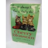 A Cherry Blossom pictorial tin advertising sign depicting three kittens sat in boots, 17 1/2 x 27
