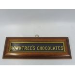 An original Rowntree's Chocolates glass panel, recently framed for display, 16 x 6".
