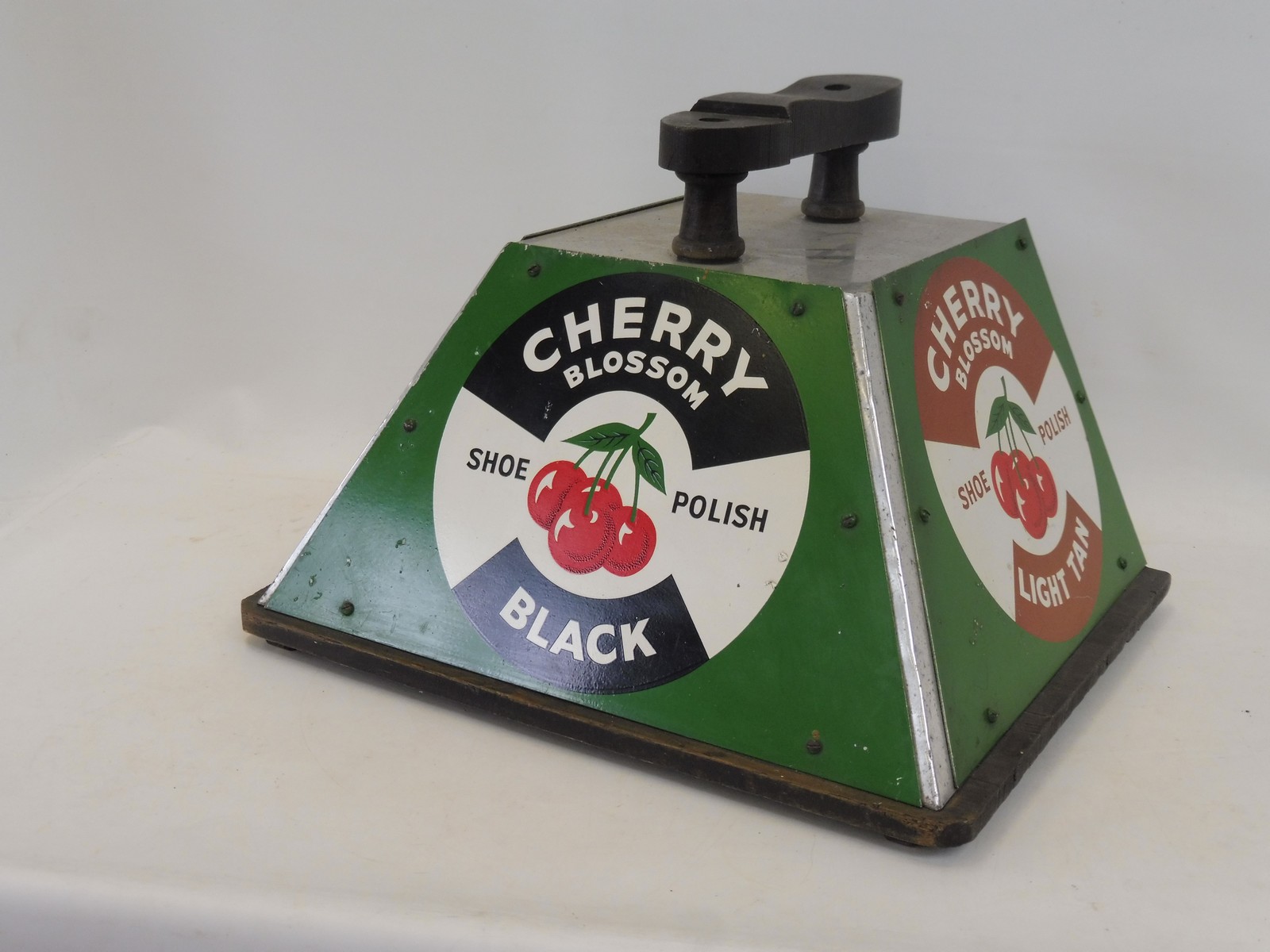 A Cherry Blossom shoe shine box, unusually with tin rather than enamel panels.