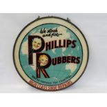 A Phillips Rubbers pictorial circular glass advertising sign set within a metal hanging frame, in