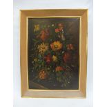 A 20th Century still life of flowers, oil on canvas, signed lower right, 24 1/2 x 32 3/4".