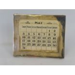 A silver desktop calendar, with six celluloid and one paper insert, Sheffield 1910, by Walker and
