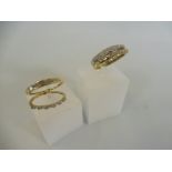 Four eternity style rings, three yellow gold, the fourth white gold, each set with a slender row