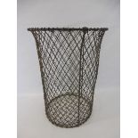 A vintage wirework basket of tapering form, 20" h.